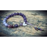  Stílusos karkötő antikolt gombzárral és kézzel készült részletekkel